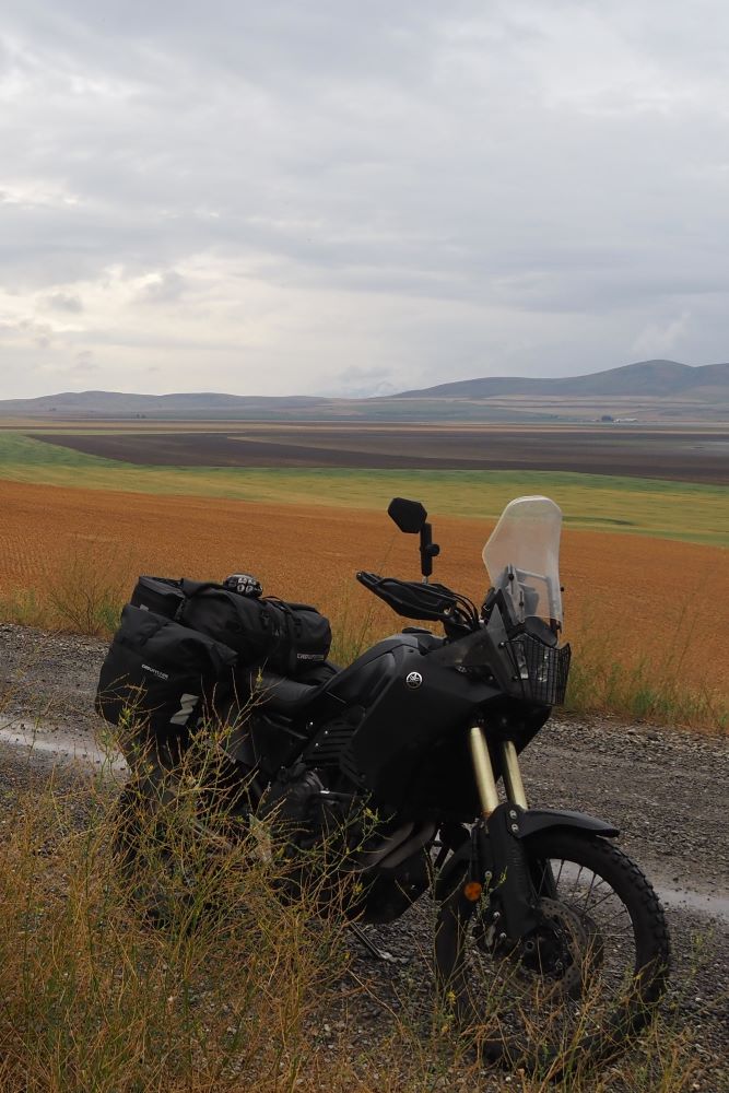 Motorcycle parked out by farmland, Idaho Utah