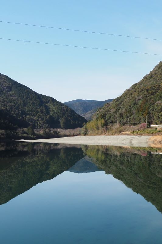 Reflection on clear river near Kochi, Japan