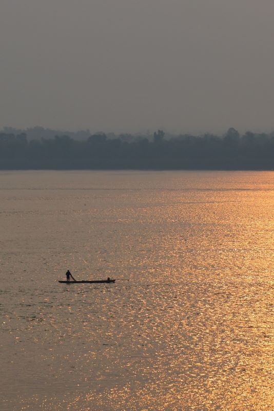 Fishing on the Mekong at sunset, Cambodia