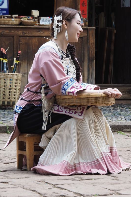 Lady in traditional dress, Shaxizhen market, China