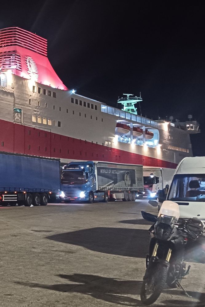 A ferry moored at night in Brinisi, Greece